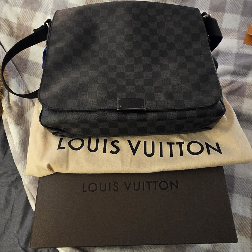 Louis Vuitton Black Messenger Bag with Iconic Design